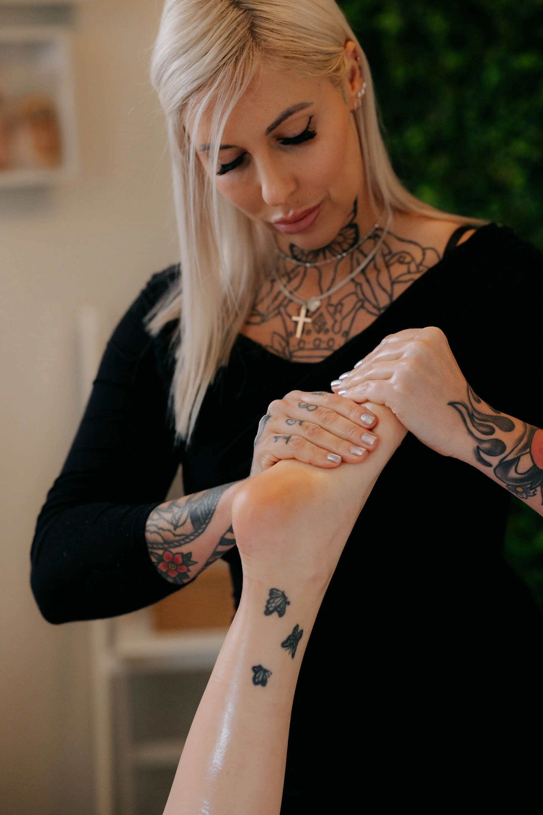 Kate Firmin providing wellness treatments in her Lake Macquarie studio
